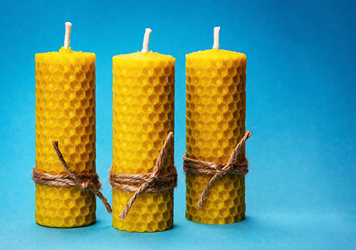 three pillar candles made of beeswax